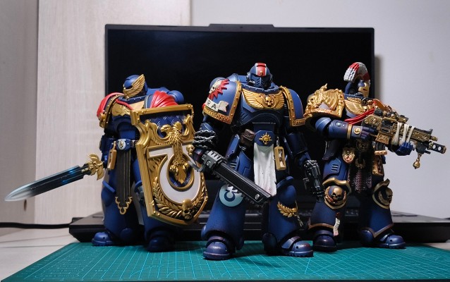 战锤40000：星际战士 极限战士 配备精工爆矢来福枪,链锯剑和爆矢手枪的圣物盔甲兵